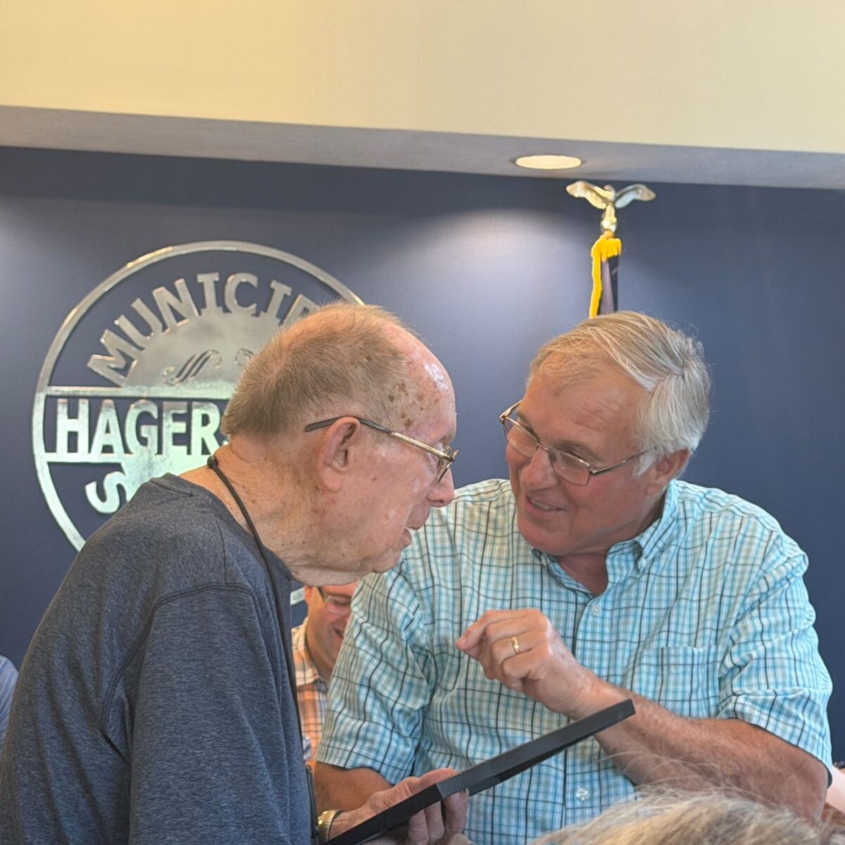 Council honors centenarian, superintendent 