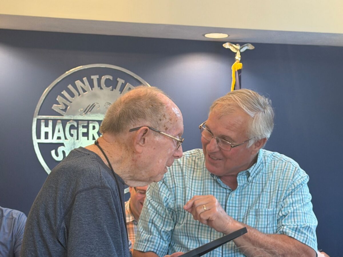 Council honors centenarian, superintendent 