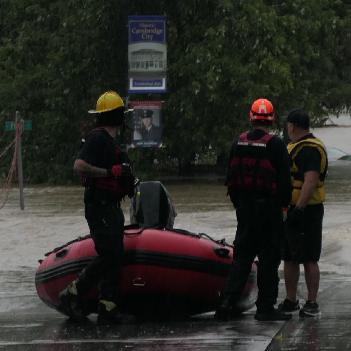 RFD boat torn, vehicle submerged in flooding